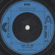 Load image into Gallery viewer, Opus : Live Is Life / Up And Down (7", Single, Blu)