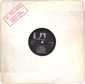 Dr. Feelgood : She's A Windup (12", Single, Ltd, S/Edition)