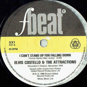 Elvis Costello & The Attractions : I Can't Stand Up For Falling Down (7", Single, Dam)