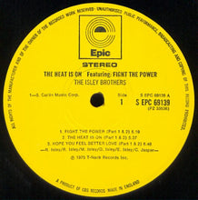 Load image into Gallery viewer, The Isley Brothers : The Heat Is On Featuring: Fight The Power (LP, Album)
